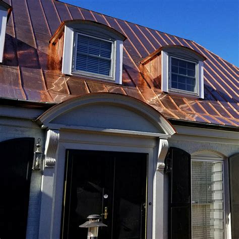 shiny copper metal porch roof on brown house|copper color metal roofing cost.